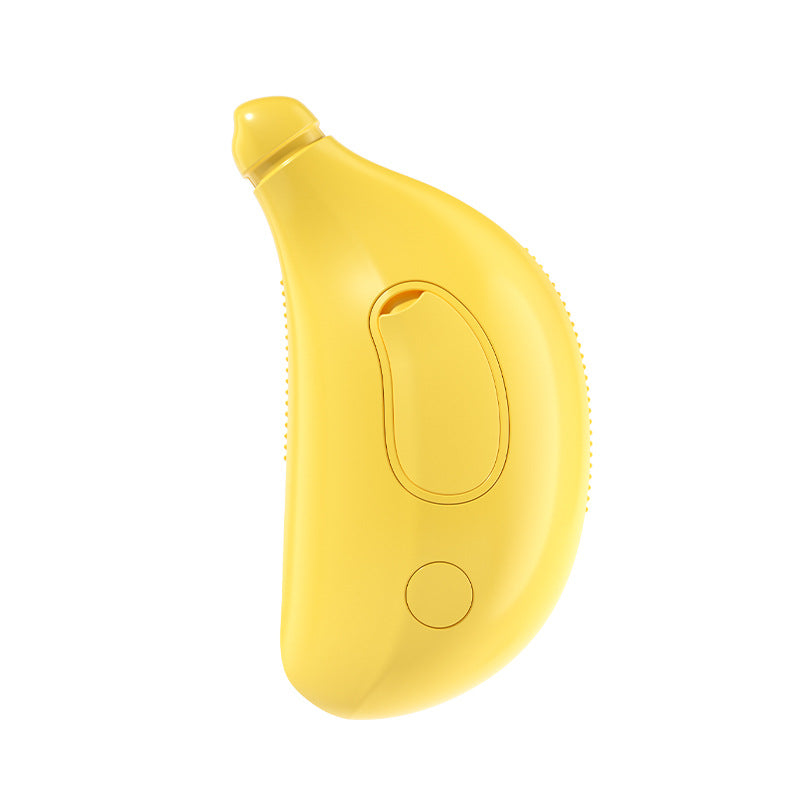 Yellow pet steam brush with textured grip, embossed panel, and button
