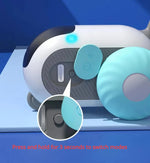 Interactive cat car toy side panel with blue control button and orange wheel