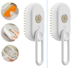 Electric steam pet brush with white body and comb bristles on beige handle