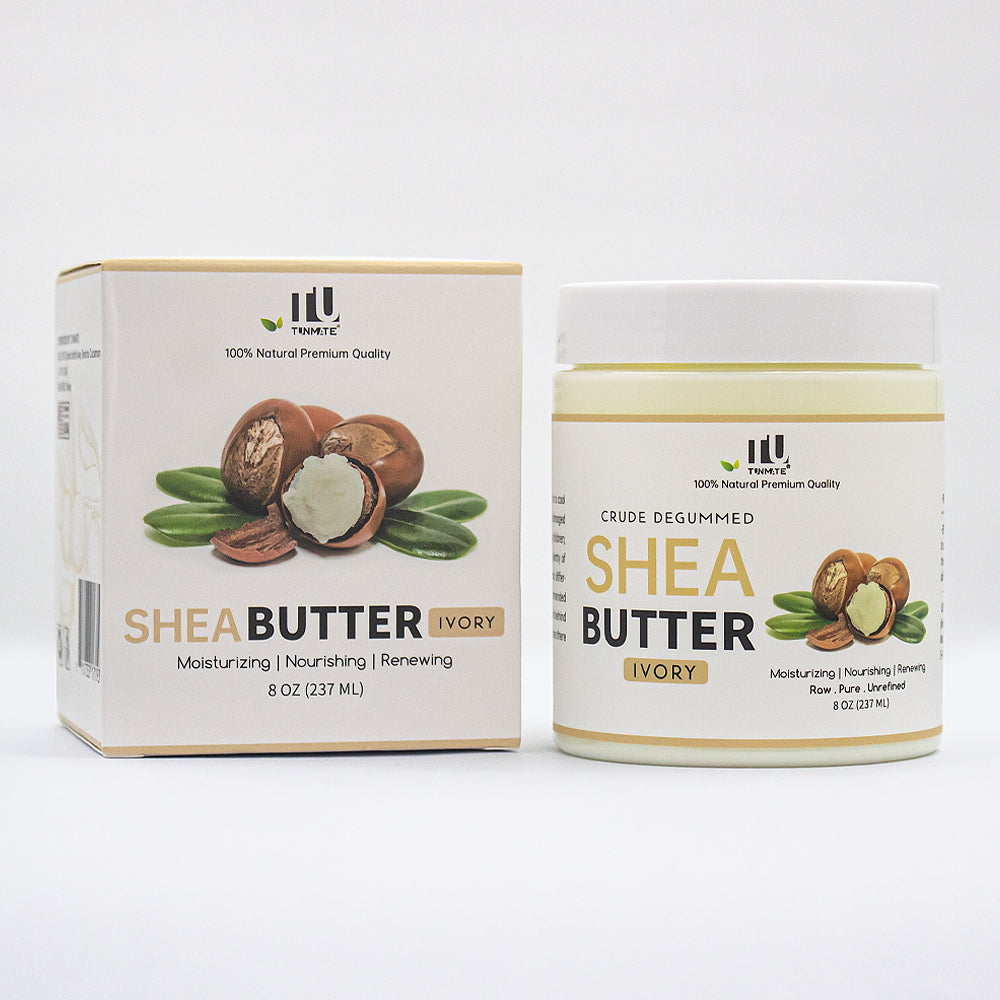 Ivory shea butter body butter jar beside its box, white lid, beige cream.