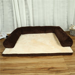 Pet dog bed with dark brown cord bolster and cream cushioned base