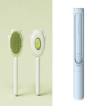 Pet grooming massage comb with green round bristle brushes and a blue curea2 handle
