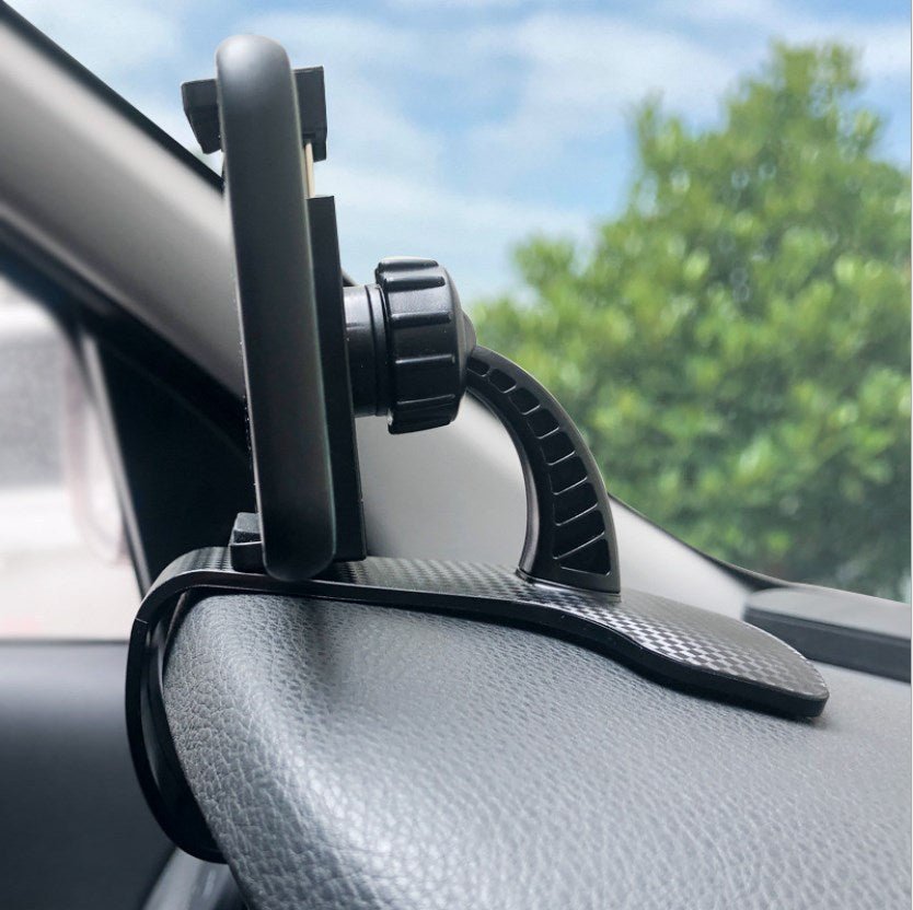Car dashboard phone holder with vertical mount and curved clamp, black plastic