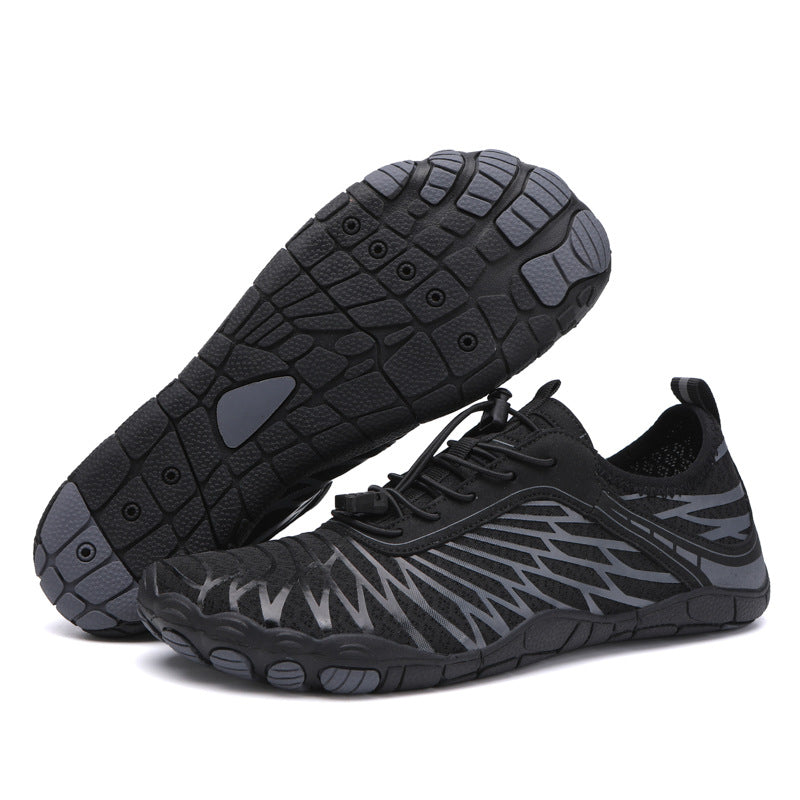Black unisex water shoes with lace-up upper and detailed tread outsole