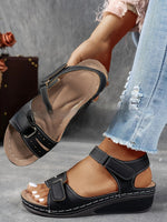 Thick-sole velcro strap sandals, black with open toe and cushioned platform sole