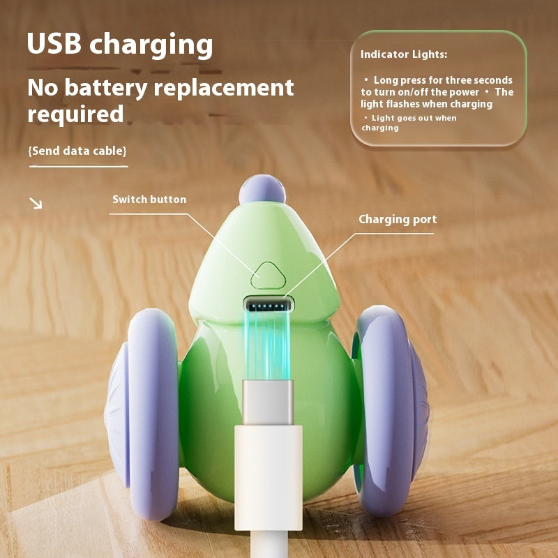 Green cat teaser mouse with USB charging port under body and two purple wheel covers