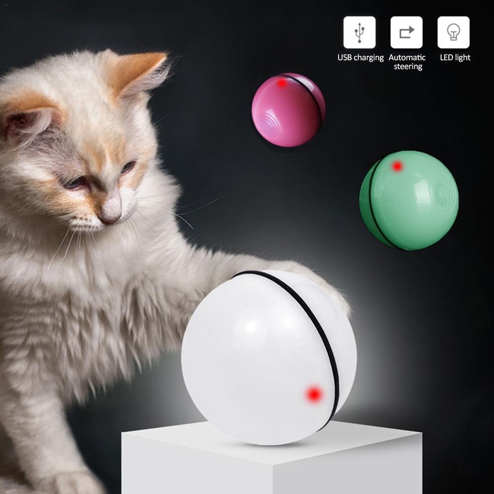 LED rolling cat toy ball in white with black trim and red light dots