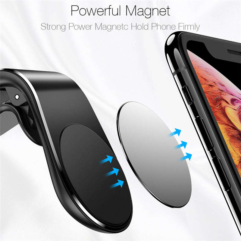 Car air vent magnetic phone holder with strong magnet holding a phone in place
