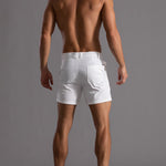 Men's white cotton shorts with button front and side pockets