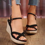 Black open-toe wedge sandals with ankle buckle, crisscross straps, woven hemp rope