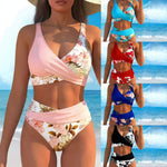 Pink and white floral wrap bikini set with matching high-waist bottoms
