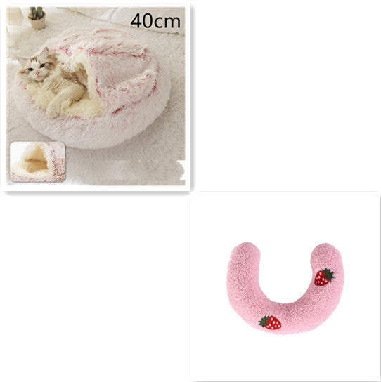 Half-moon plush bolster with pink fabric and strawberry patches