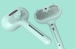 Mint handheld pet grooming brush with comb pins and side charging port