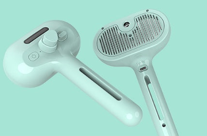 Mint handheld pet grooming brush with comb pins and side charging port