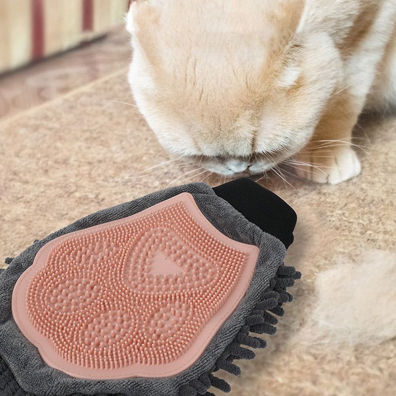2-in-1 pet grooming glove: pink silicone bristle pad on gray chenille