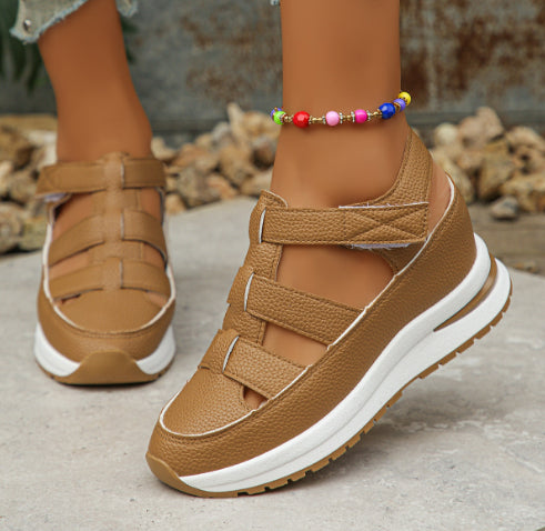 Tan wedge platform sandals with cutout uppers and hook-and-loop straps