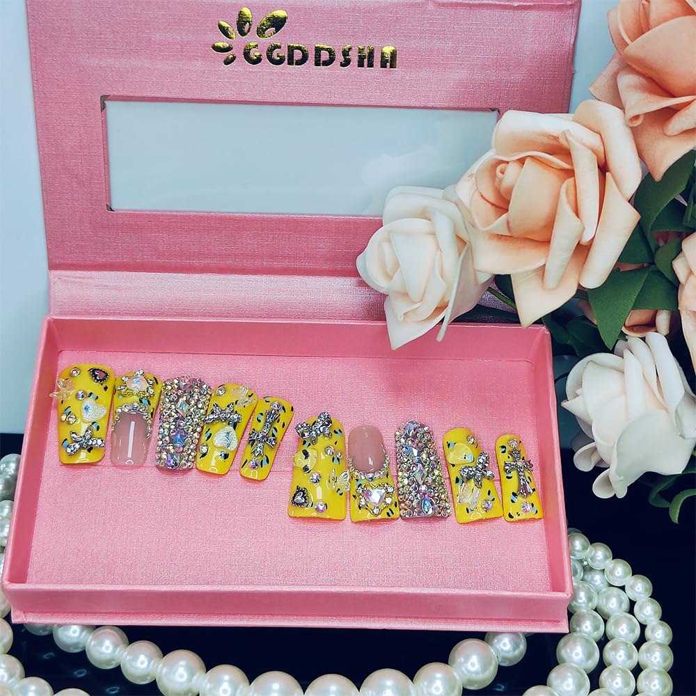 Duck-themed yellow rhinestone press-on nails in medium square shape