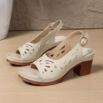 Cream peep-toe platform sandals with geometric cutouts and round buckle mid heel