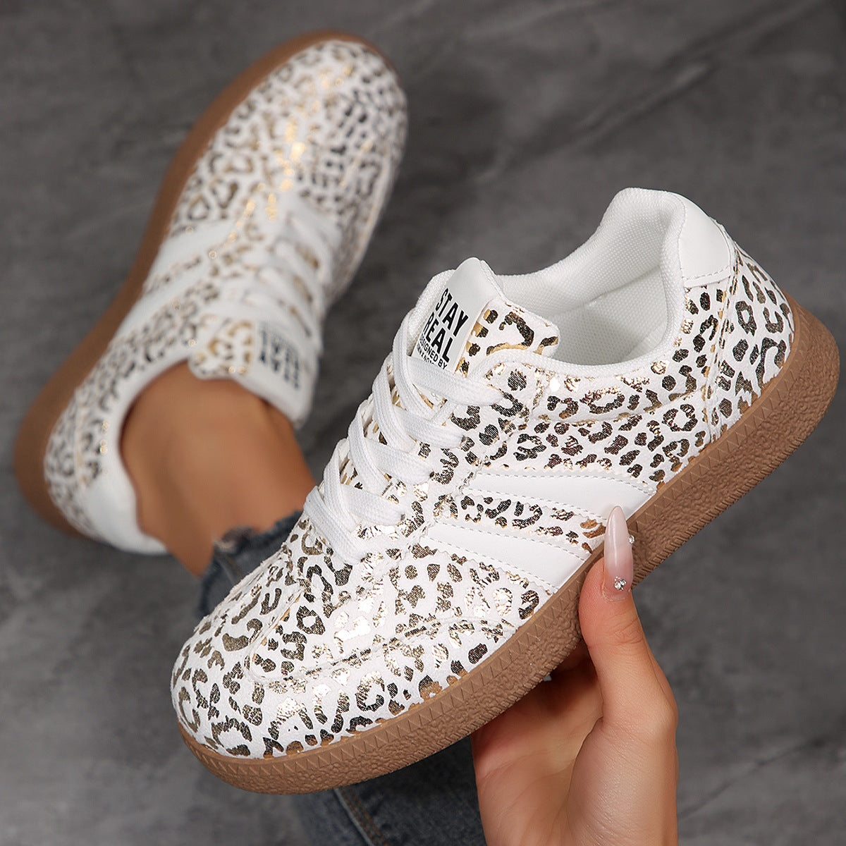 Casual sneakers in white with leopard print and tan rubber sole