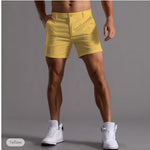Men's yellow cotton shorts with button front and side pockets