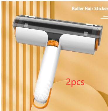 Pet hair removal roller with white handle and orange grip, dark transparent lint drum